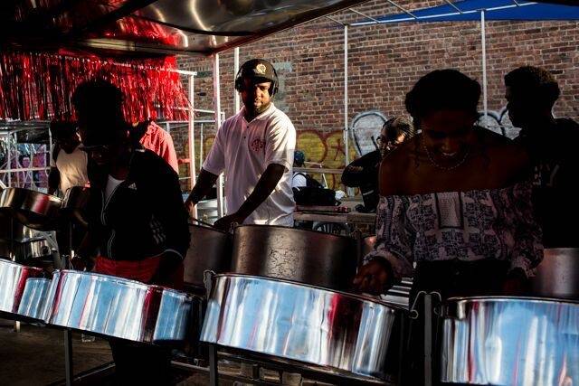 Members of the Despers USA steel band at their practice space on the corner of Classon Avenue and Pacific Street in Crown Heings.